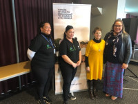 A group photo showing four staff members from Dunedin-based Pacific health providers